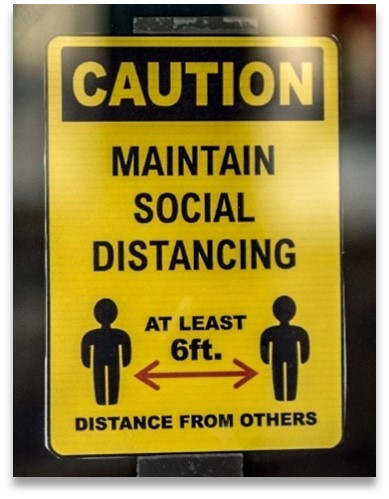 Sign reading 'Caution, Maintain Social Distancing, at least 6 ft.'