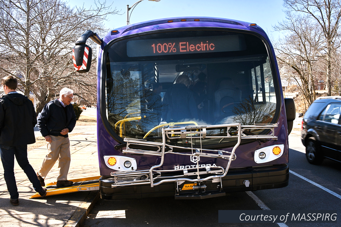A view of a 100% electric bus from the front with passengers boarding. Courtesy of MASSPIRG
